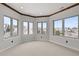 Bright bedroom with three large windows and neutral carpeting at 1039 Buffalo Ridge Way, Castle Pines, CO 80108