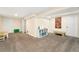 Finished basement area offering versatile space for recreation and activities at 9376 W Wagon Trail Cir, Littleton, CO 80123