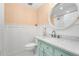 Stylish bathroom with a custom vanity, marble countertop, and modern fixtures at 9376 W Wagon Trail Cir, Littleton, CO 80123