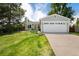 Charming single-Gathering home with a two-car garage and a well-manicured front lawn at 9376 W Wagon Trail Cir, Littleton, CO 80123