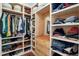 Spacious walk-in closet with custom shelving and ample storage space at 9376 W Wagon Trail Cir, Littleton, CO 80123