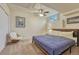 Cozy bedroom featuring neutral decor, a ceiling fan, and comfortable furnishings for a relaxing retreat at 43793 Buckskin Rd, Parker, CO 80138