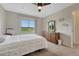 Bedroom with large window and view of surrounding green space at 43793 Buckskin Rd, Parker, CO 80138