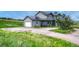 Charming two-story home with a spacious driveway and an attached two-car garage at 43793 Buckskin Rd, Parker, CO 80138