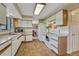 Well-maintained kitchen featuring white cabinetry and granite countertops, creating a clean and functional cooking space at 43793 Buckskin Rd, Parker, CO 80138