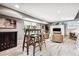 Finished basement recreation area with a fireplace and seating area at 3824 S Xenia St, Denver, CO 80237