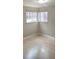 Bright bedroom with hardwood floors and large windows at 14066 E 27Th Ave, Aurora, CO 80011