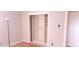 Built-in shelving and hanging space in this closet at 14066 E 27Th Ave, Aurora, CO 80011