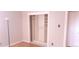 Built-in shelving in spacious bedroom closet at 14066 E 27Th Ave, Aurora, CO 80011