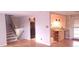 View of wooden stairs leading to the lower level at 14066 E 27Th Ave, Aurora, CO 80011