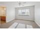 Bright bedroom featuring a ceiling fan, neutral walls and carpet, and natural light at 15573 E Prentice Ln, Centennial, CO 80015