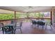 Spacious outdoor deck for entertaining with elegant seating and outdoor views at 15573 E Prentice Ln, Centennial, CO 80015
