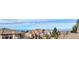 A scenic neighborhood view with multiple homes and stunning mountain views at 15573 E Prentice Ln, Centennial, CO 80015