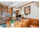 Bright office space with custom wood finishes, offering plenty of room for storage and a sophisticated aesthetic at 15573 E Prentice Ln, Centennial, CO 80015