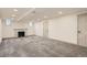 Spacious basement area with a fireplace, carpet flooring, and recessed lighting at 3361 S Dahlia St, Denver, CO 80222