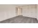 Bright bedroom with neutral walls, carpet floors, and ample built-in storage at 3361 S Dahlia St, Denver, CO 80222