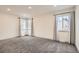 Spacious bedroom with carpeting, natural light and neutral color scheme at 3361 S Dahlia St, Denver, CO 80222