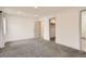 Spacious bedroom featuring neutral walls, carpet floors, and ample closet space at 3361 S Dahlia St, Denver, CO 80222