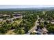 Expansive aerial view featuring lush greenery, scattered buildings, and a serene park at 6007 Yarrow St # D, Arvada, CO 80004