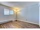The bedroom offers ample space, neutral colors and laminate flooring at 6007 Yarrow St # D, Arvada, CO 80004