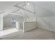 Attic space featuring exposed beams and natural light at 1346 Steele St, Denver, CO 80206