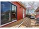 Beautiful deck adjacent to the house with outdoor grill, and colorful mural on the adjacent building at 1346 Steele St, Denver, CO 80206