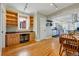 Home office space with built-in shelving, desk and seamless access to the kitchen at 1346 Steele St, Denver, CO 80206