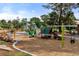 Large playground with a variety of play structures for active recreation at 1346 Steele St, Denver, CO 80206