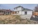 Backyard with patio, gazebo, and sliding glass doors at 13158 W 62Nd Dr, Arvada, CO 80004