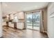 Modern kitchen with stainless steel appliances and sliding glass doors to the backyard at 13158 W 62Nd Dr, Arvada, CO 80004