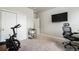 Bright bedroom with closet and neutral carpet, perfect for a home office or workout space at 11524 Dewey St, Parker, CO 80138