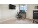 Bedroom featuring desk space with a computer and an overhead TV at 11524 Dewey St, Parker, CO 80138