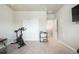 Bright bedroom with closet and neutral carpet, perfect for a home office or workout space at 11524 Dewey St, Parker, CO 80138