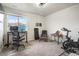 Bedroom with a desk area and additional spaces for a chair and exercise equipment at 11524 Dewey St, Parker, CO 80138