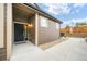 Inviting front entrance with stylish door, complemented by manicured landscaping and charming exterior at 11524 Dewey St, Parker, CO 80138