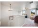 Bright and airy living space with plush carpeting, contemporary lighting, and scenic window views at 11524 Dewey St, Parker, CO 80138