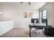 Open loft area with carpeted floors and space for a desk at 11524 Dewey St, Parker, CO 80138