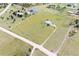 Aerial view of a home with surrounding acreage and a long driveway at 46531 Sundance Trl, Parker, CO 80138