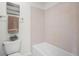 Clean and functional bathroom with a bathtub and tile surround, offering a practical and well-maintained space at 46531 Sundance Trl, Parker, CO 80138