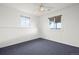 Bedroom featuring a ceiling fan, and windows providing natural light and pastoral views at 46531 Sundance Trl, Parker, CO 80138