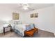 Cozy bedroom with soft carpet, comfy bed and stylish decor creates a relaxing atmosphere at 5425 County Road 32 # 27, Mead, CO 80504