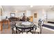 The community living room features a large table and lounge area at 5425 County Road 32 # 27, Mead, CO 80504