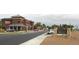 Welcoming entrance to Mead with a prominent sign and well-maintained street view at 5425 County Road 32 # 27, Mead, CO 80504