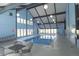 Indoor pool area with multiple windows and plenty of room for guests at 3436 S Locust St # D, Denver, CO 80222