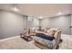 A cozy basement with recessed lighting and a comfortable sectional sofa, perfect for relaxing and entertaining at 6046 Vrain St, Arvada, CO 80003