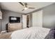 Bedroom featuring a ceiling fan, carpet, and a dresser at 6046 Vrain St, Arvada, CO 80003