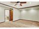 Bedroom boasts neutral walls and carpeting, ceiling fan and recessed lighting at 7895 W 67Th Ave, Arvada, CO 80004