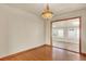 Dining room with hardwood floors and decorative lighting at 7895 W 67Th Ave, Arvada, CO 80004