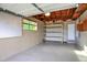 Spacious garage with built in shelving and plenty of space for storage at 7895 W 67Th Ave, Arvada, CO 80004