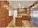 Well-equipped kitchen with stainless steel appliances and a central island at 7895 W 67Th Ave, Arvada, CO 80004
